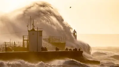 Wild seas with high waves crashing onto the coast