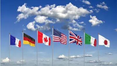 أعلام فرنسا وألمانيا وكندا والولايات المتحدة والمملكة المتحدة واليابان