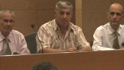 Three Cuban dissidents at a news conference