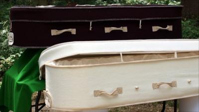 Burial park manager Fran Hall has a look at some of the coffins on display at the National Coffin Exhibition