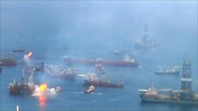 Flotilla of ships above the oil leak