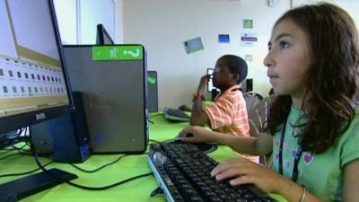 Child using a computer