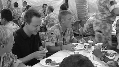 David Cameron eating with troops in Afghanistan