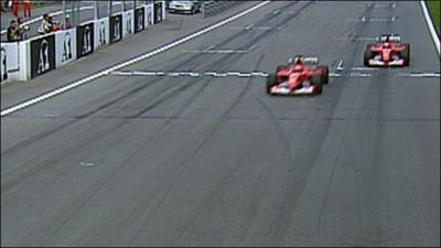Michael Schumacher overtakes Rubens Barrichello