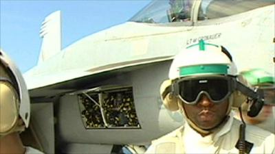 Flight deck crew member prepares an aircraft for flight