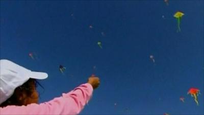 A child flies a kite in Gaza