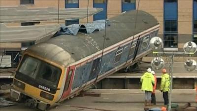 2002 Potters Bar station with train lying on platform