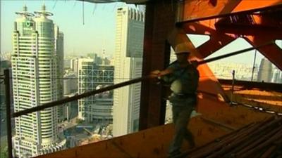 Construction worker on scaffolding