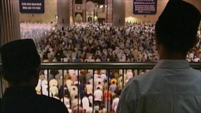 Muslims praying in a mosque