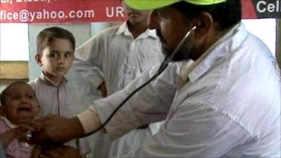 Doctors treat flood victims