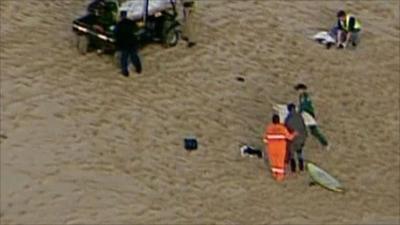 Emergency services on the beach following the shark attack