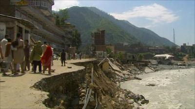 Damaged road next to river in Swat Valley