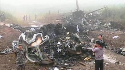 The wreckage of the Henan Airlines plane