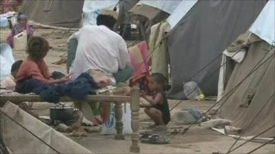 Flood victims in a makeshift camp