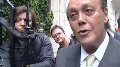 Asil Nadir speaks to the press as he arrives in Mayfair