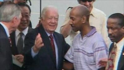 Former President Jimmy Carter and Aijalon Mahli Gomes