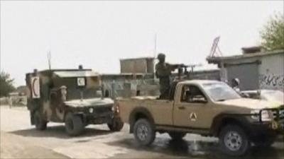 Afghan army vehicles near attack site