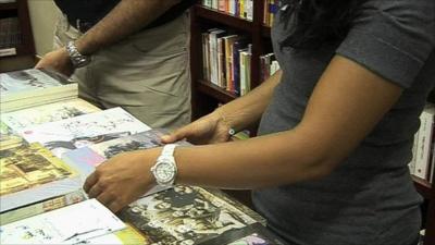 People browsing through books