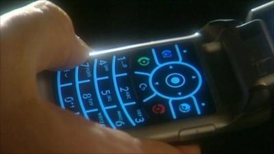 A mobile phone being used