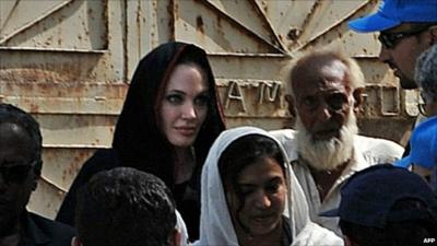 Angelina Jolie with refugees in the Azakhel camp