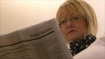 Woman reading tax letter