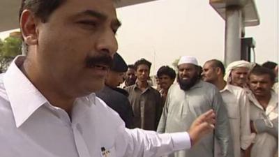 Crowds at an aid distribution centre in northern Punjab