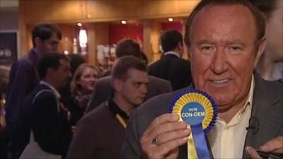 Andrew Neil with rosette