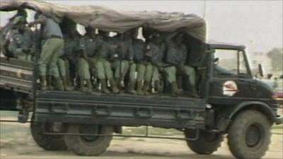 Soldiers in a military vehicle