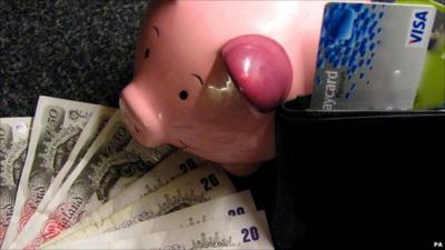 Piggy bank and credit cards