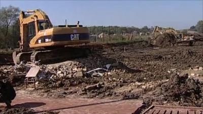 Diggers in Hungary building an emergency dam