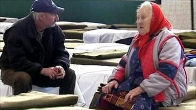 Villagers sheltering