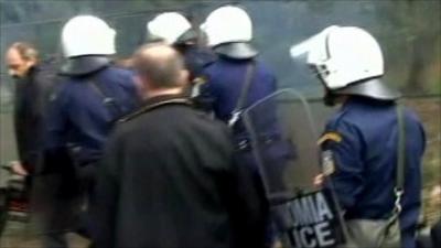 Riot police enter the Acropolis site