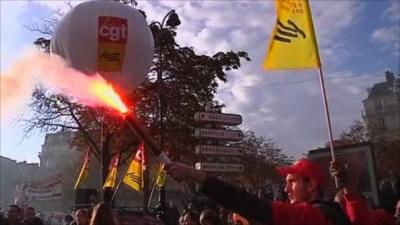 Protesters let off flares in Paris