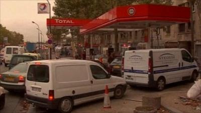 Vehicles queue at petrol station