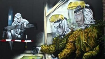 Painting of people making microchips
