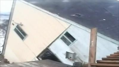 House washes into sea