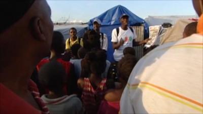 Performers in a Port-au-Prince camp