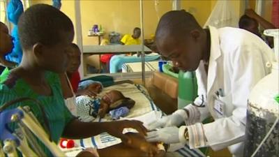 Doctor treating baby