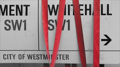 Red tape over Whitehall road sign