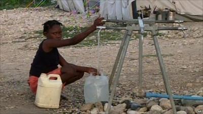 Woman filling water container