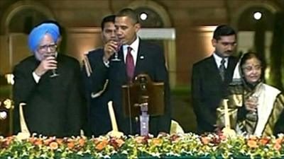 President Barack Obama proposes a toast at a state dinner in India