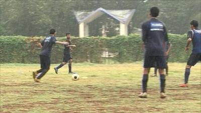 Playing football in India