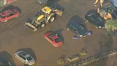 Cars damaged by flooding