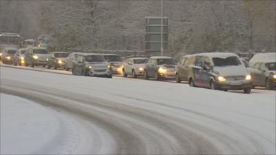 Traffic queued in snow