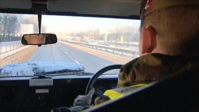 Soldier driving army vehicle