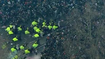 Police horse charge at protesters