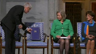 The award placed on the empty chair