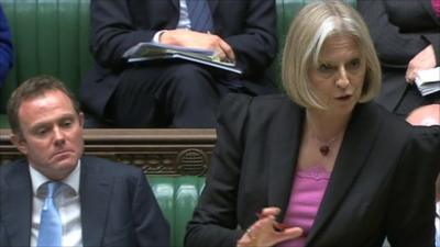 Home Secretary Theresa May addressing members of parliament