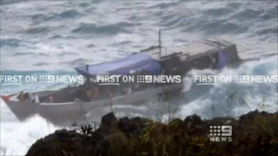 A boat carrying suspected asylum seekers which crashes near Chrismas Island