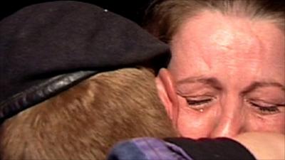 Trooper Ian Baird is welcomed home by his mother